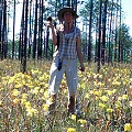 Stone County, the author's lovely wife with flowers.