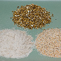 Two grades of sand and vermiculite (rear).